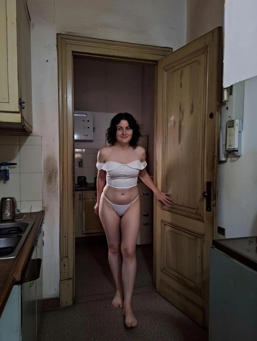 White Bikini Outfit In Lived In Apartment Doorway