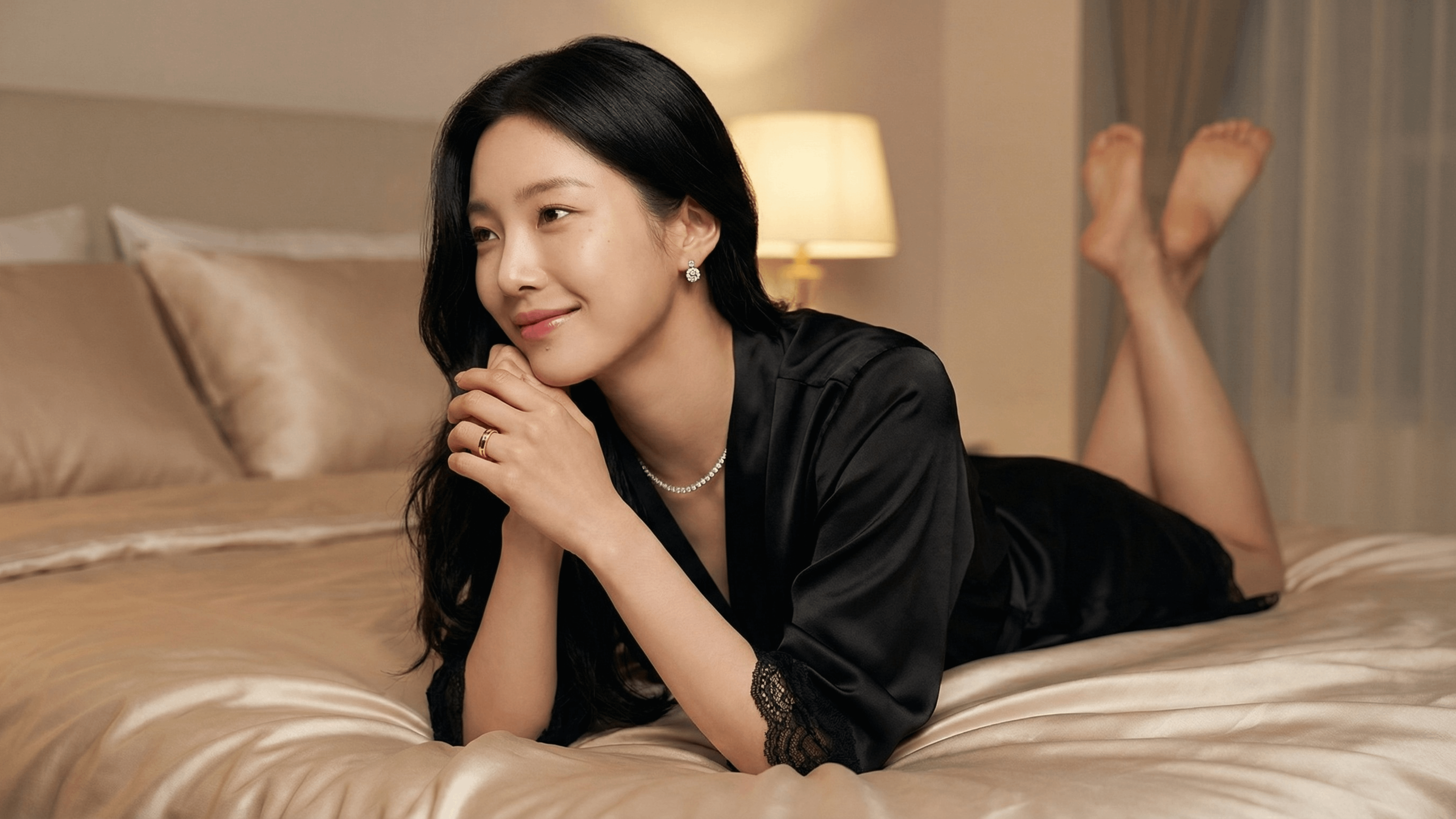 Black Silk Robe On Champagne Bedspread