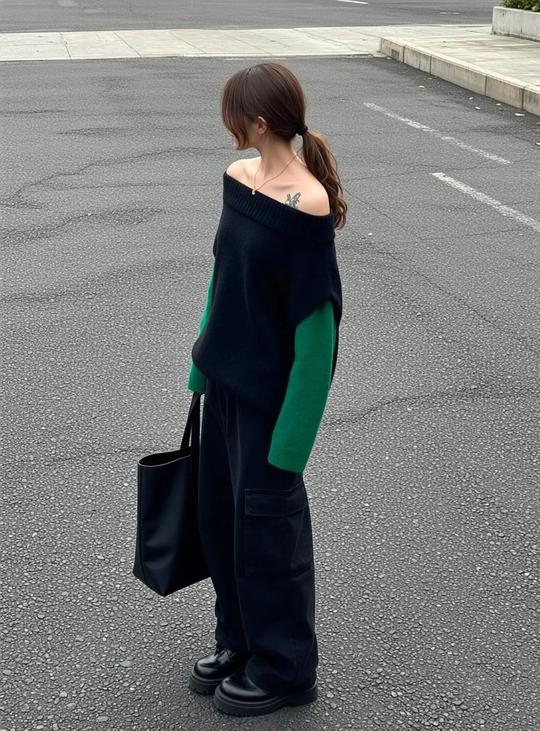 Tattoos And Necklace In An Outdoor Asphalt Parking Lot