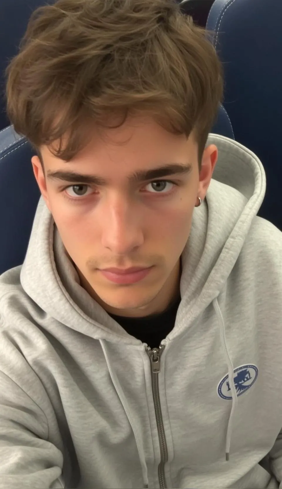 Man In Grey Hoodie Silver Earring