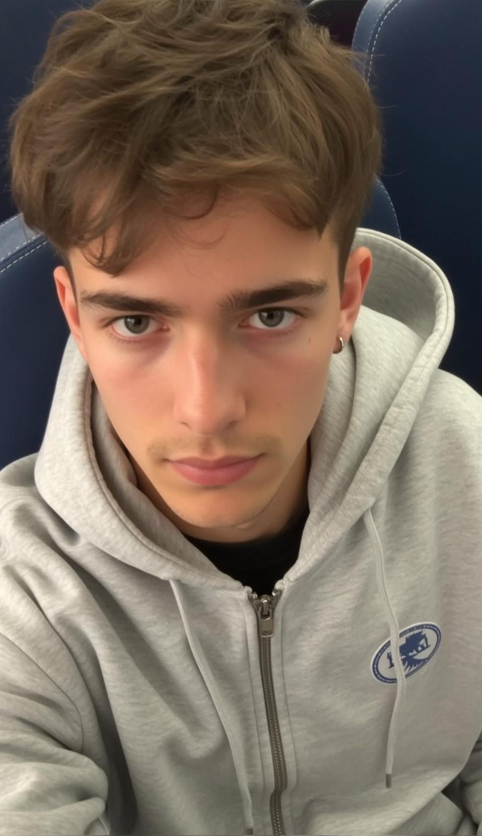 Man In Grey Hoodie Silver Earring