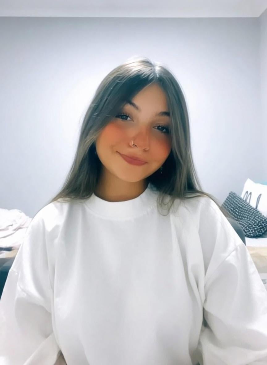 White Sweatshirt Neutral Bedroom Soft Lighting