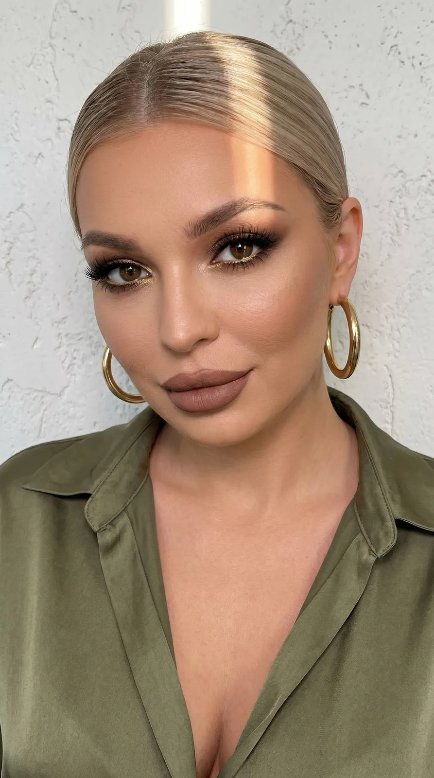 Makeup And Earrings With Olive Silk Shirt