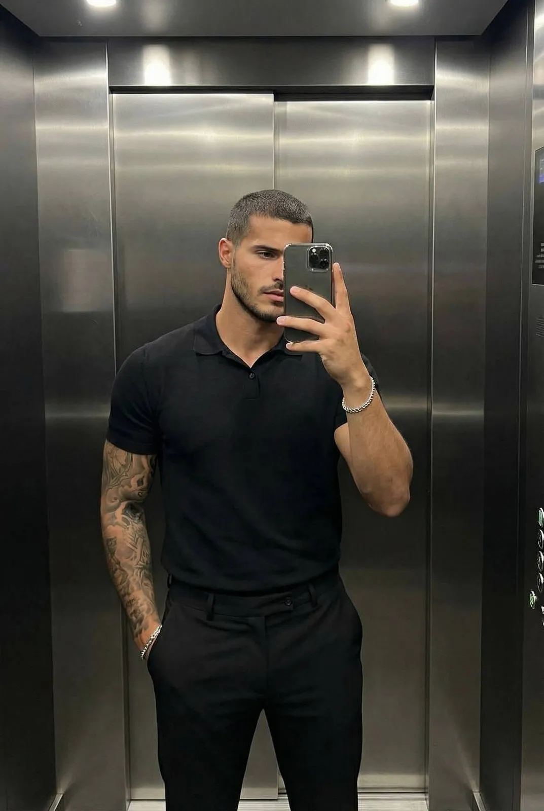 Tattoos And Bracelets In Mirror Selfie