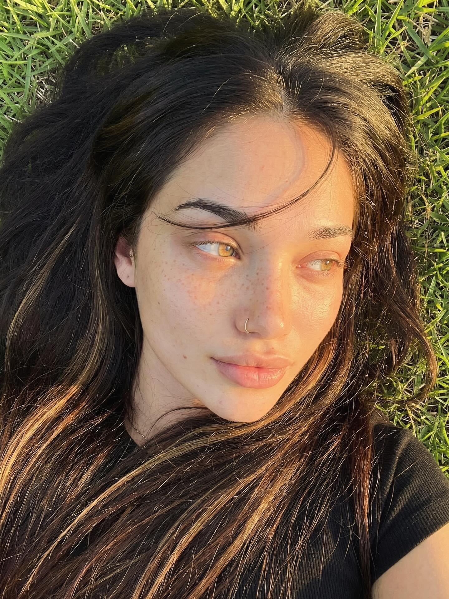 Lying In Grass Black Top Golden Sunlight