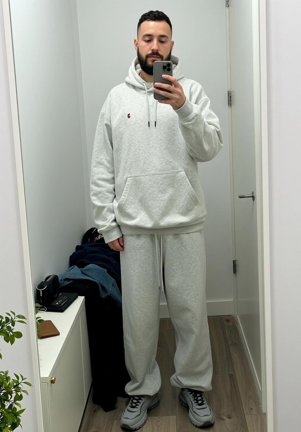 Man In Grey Hoodie Taking Selfie