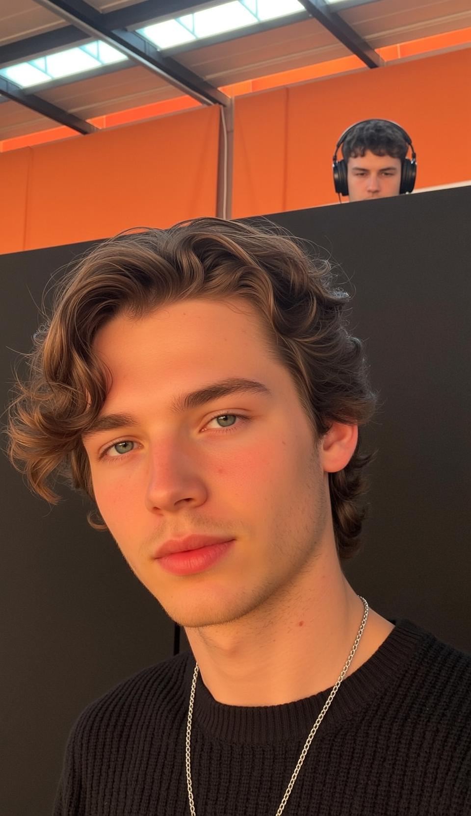 Man In Black Knit Sweater Blue Green Eyes