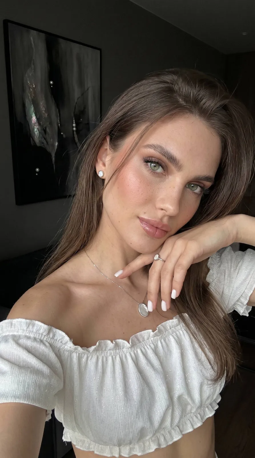 Makeup And Earrings And Necklace And Rings In Styled Portrait