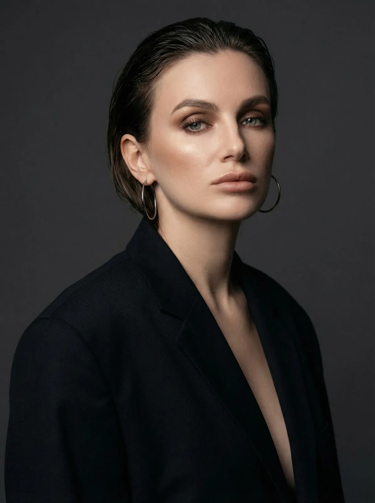 Makeup And Earrings In Studio Portrait