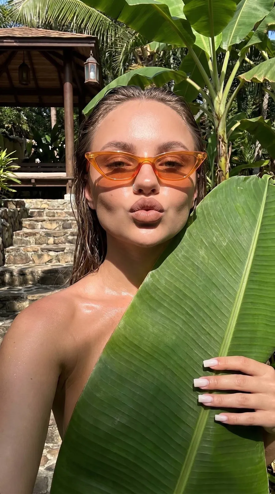Sunglasses And Makeup And Manicure In The Garden