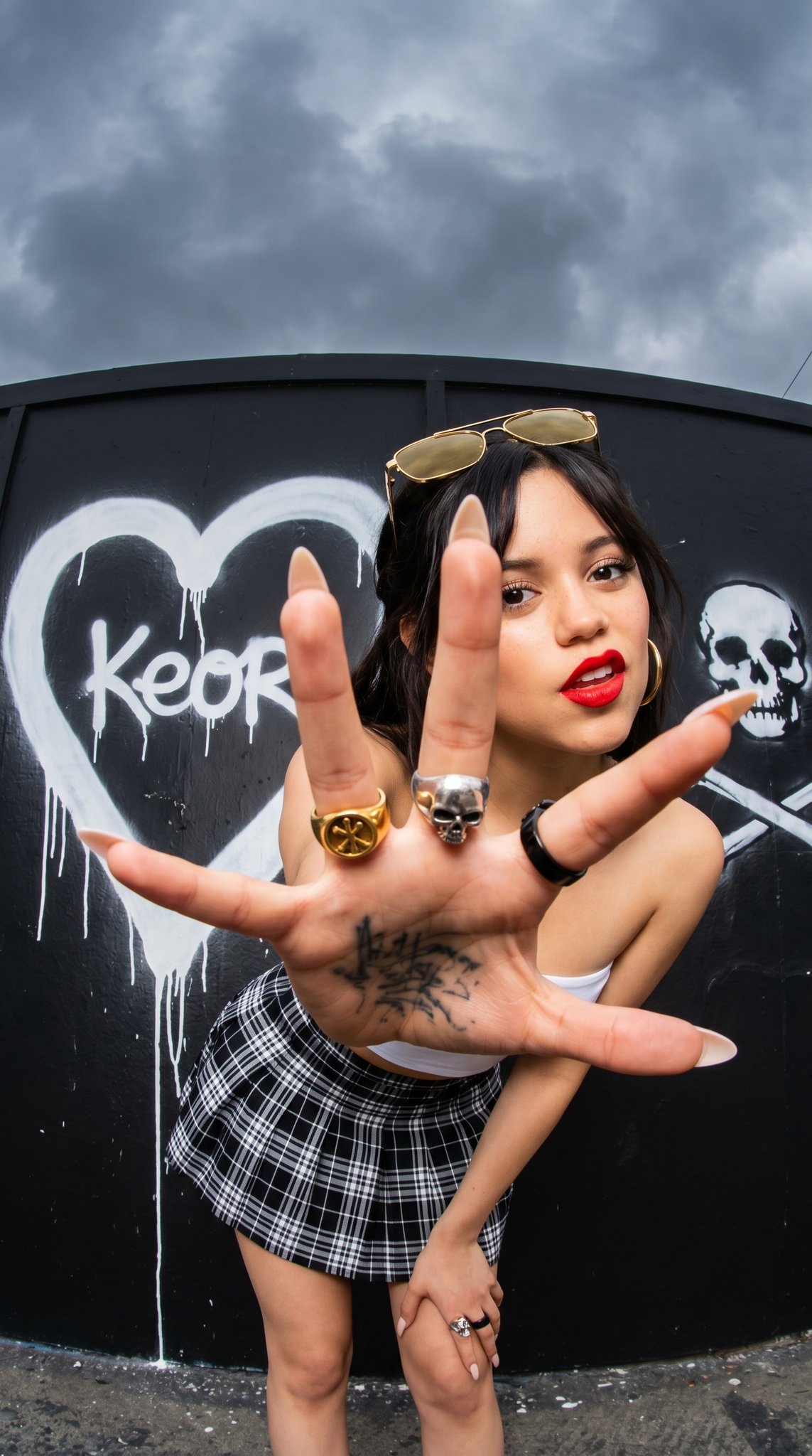 Graffiti Wall Plaid Skirt Hand Rings Dramatic Light