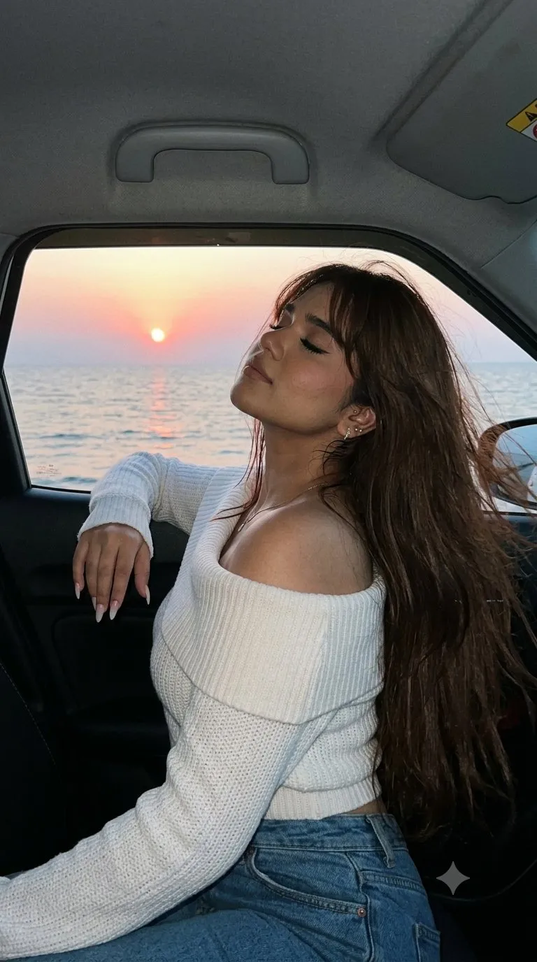 Girl Leaning From Car Window By Sea At Sunset