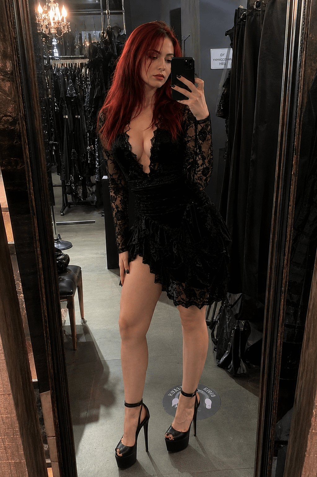 Black Lace Long Sleeved Mini Dress Deep In Dimly Lit