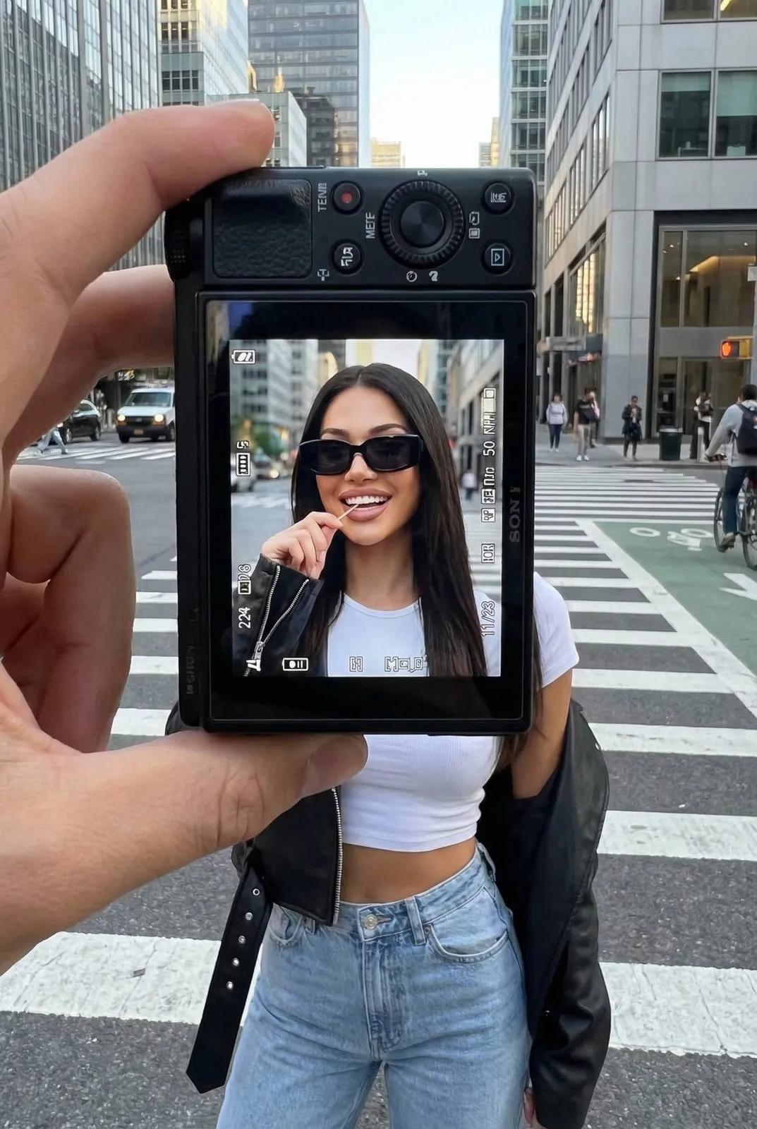 Sunglasses Smiling In Crosswalk Through Camera Screen