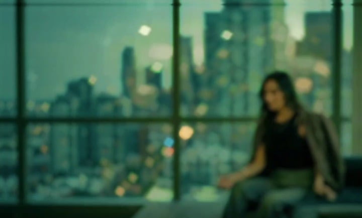 Face On Dark Sofa Blurred Cityscape Dusk