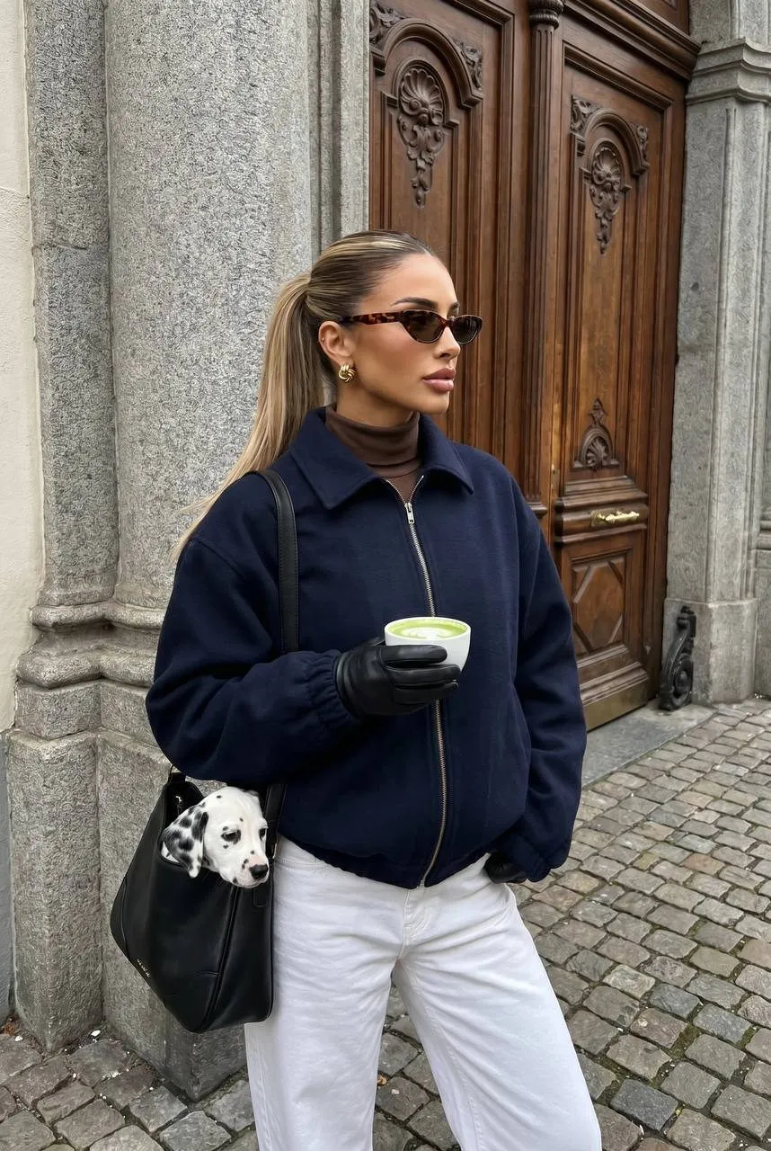 Sunglasses And Makeup And Earrings On A City Street