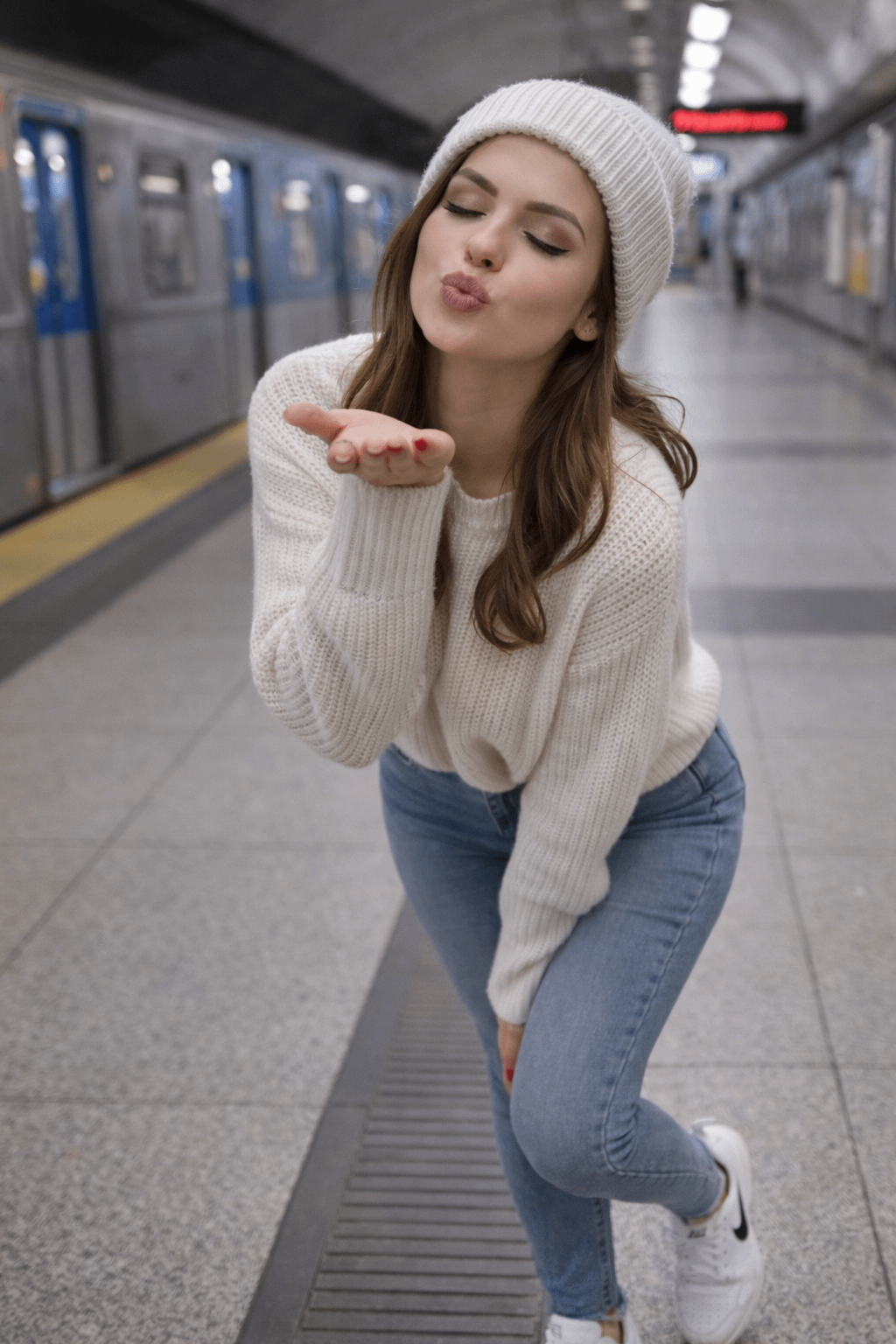 Subway Platform Blowing Kiss Cream Knit Sweater