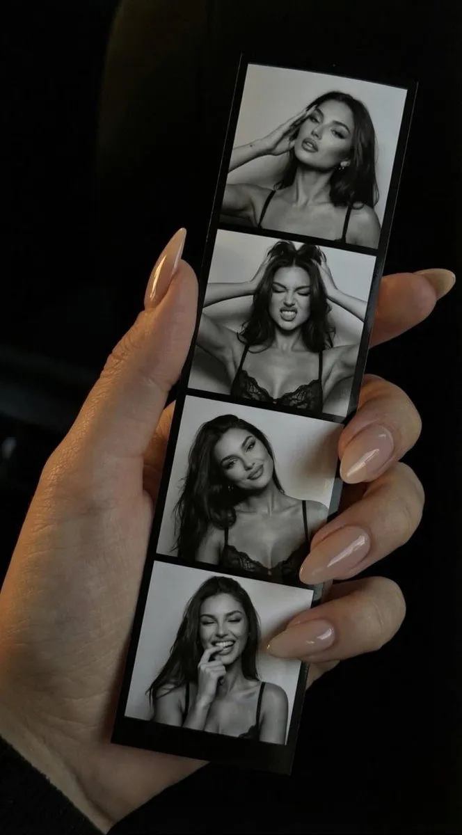 Hand Holding Photobooth Strip