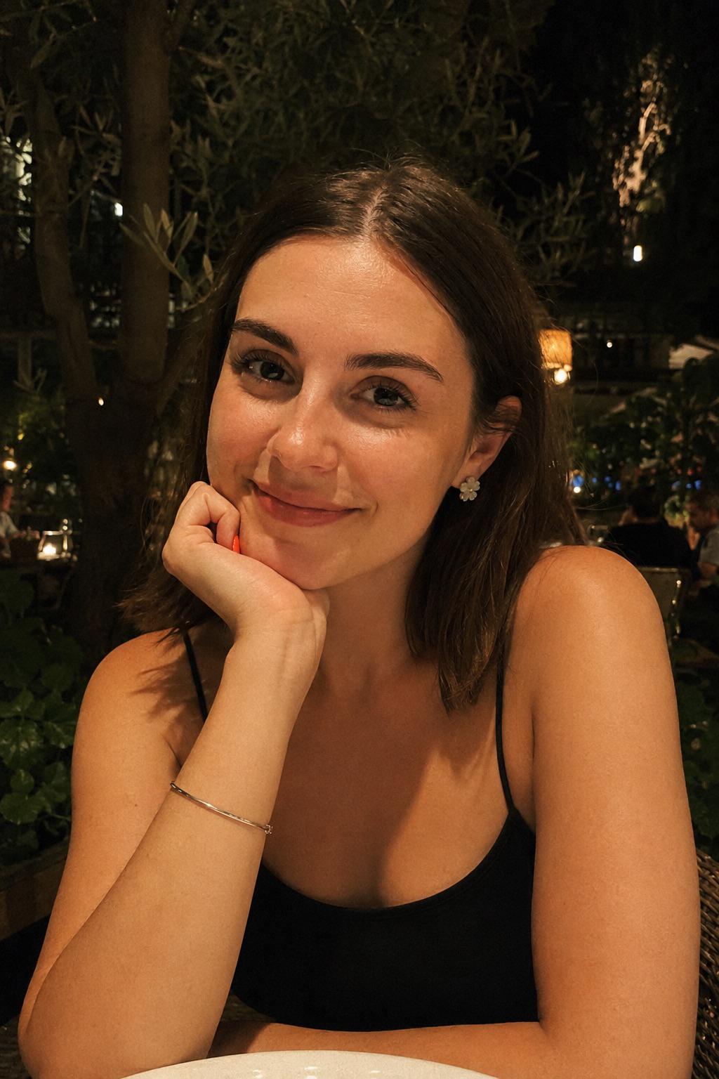 Simple Black Spaghetti Strap Camisole At Outdoor Restaurant Table