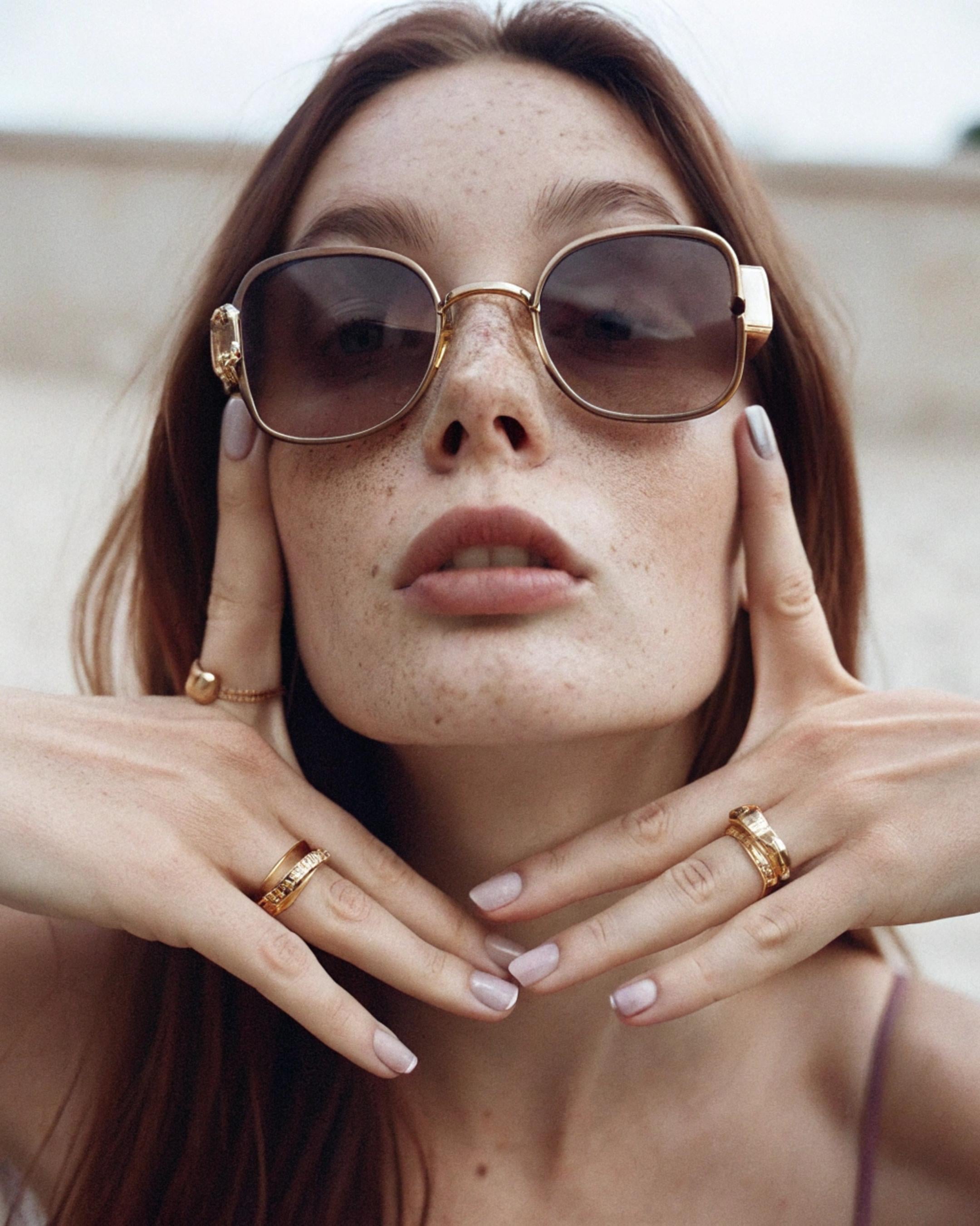 Face Framed By Hands Gold Sunglasses