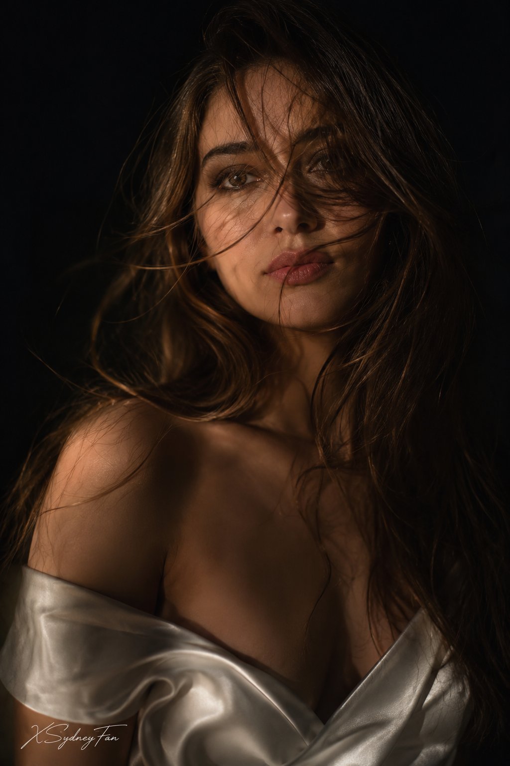 Windswept Dark Hair White Satin Shoulders Black Background