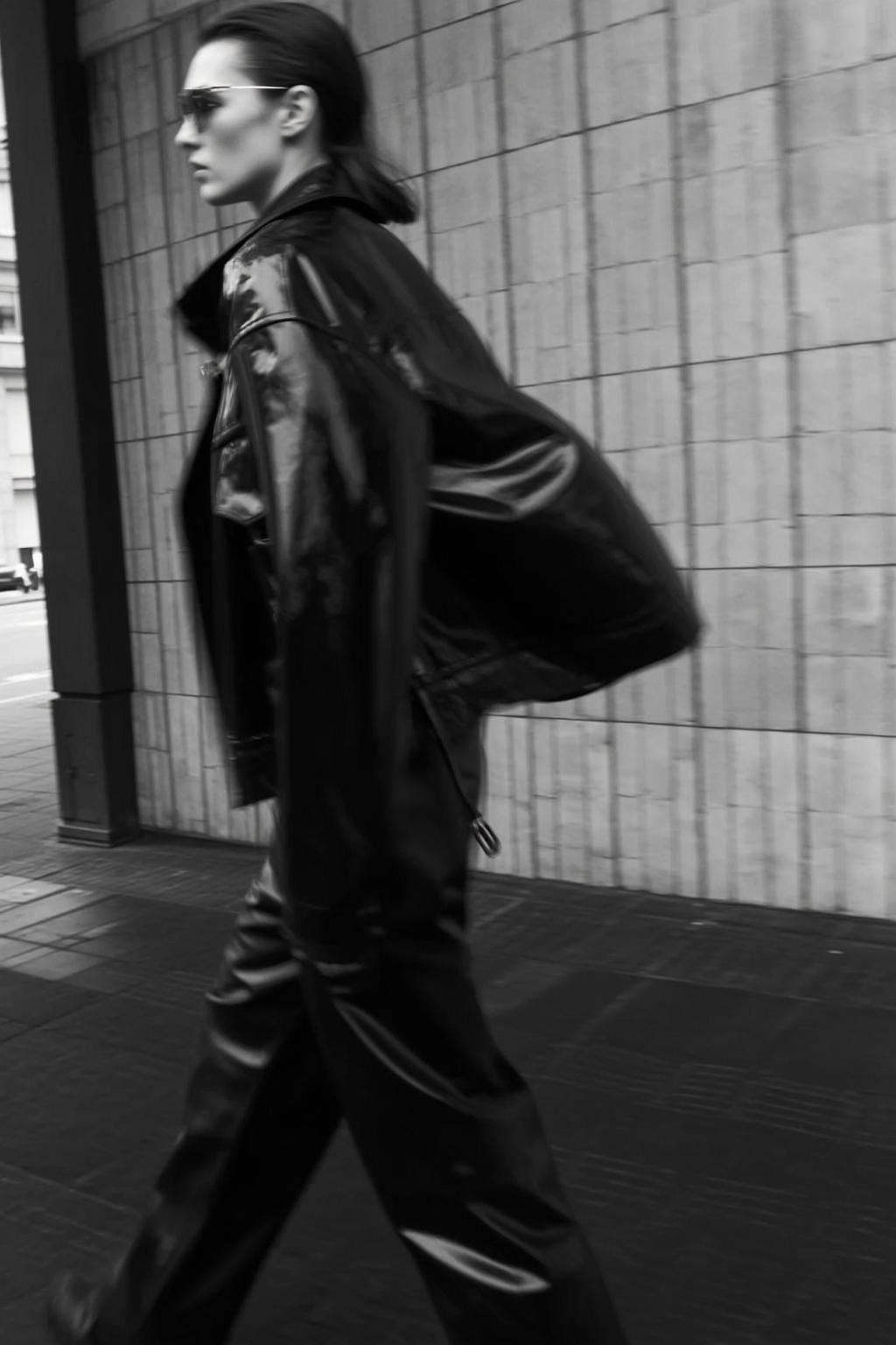 Full-body Medium Shot Black And White Photograph Captures Woman Walking