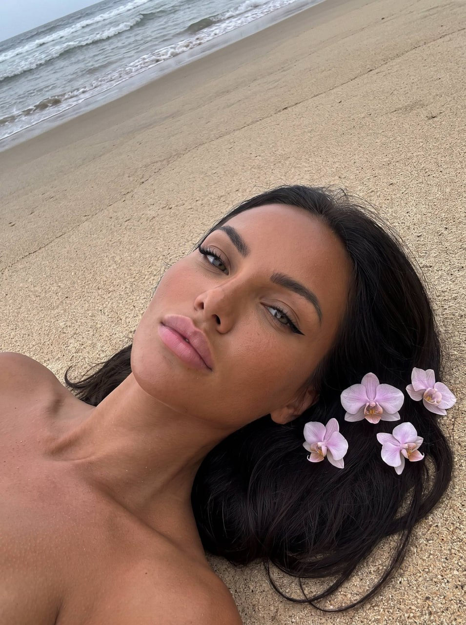Lying On Sand Ocean Edge Overhead Selfie