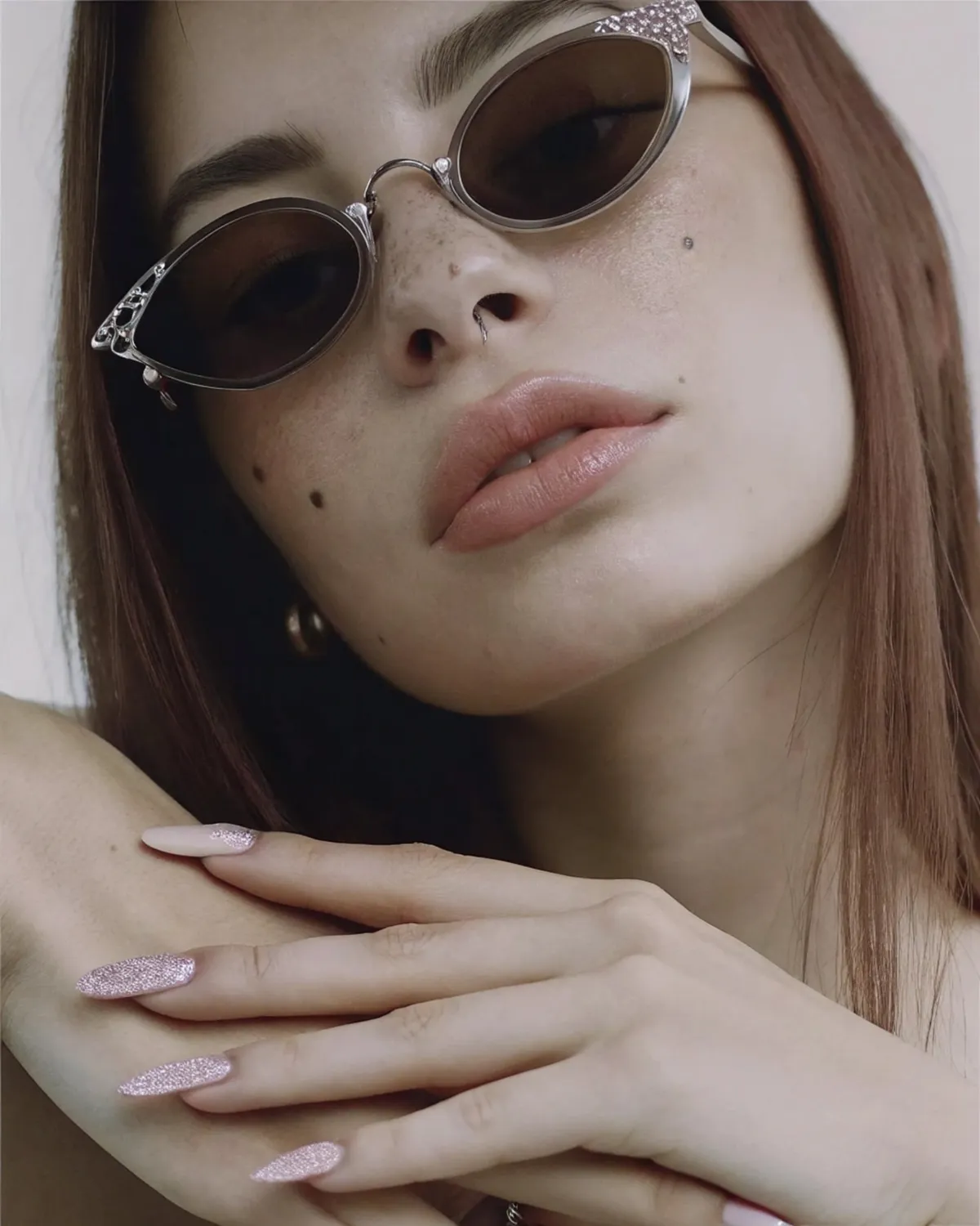 Face With Crystal Embellished Sunglasses And Septum Ring