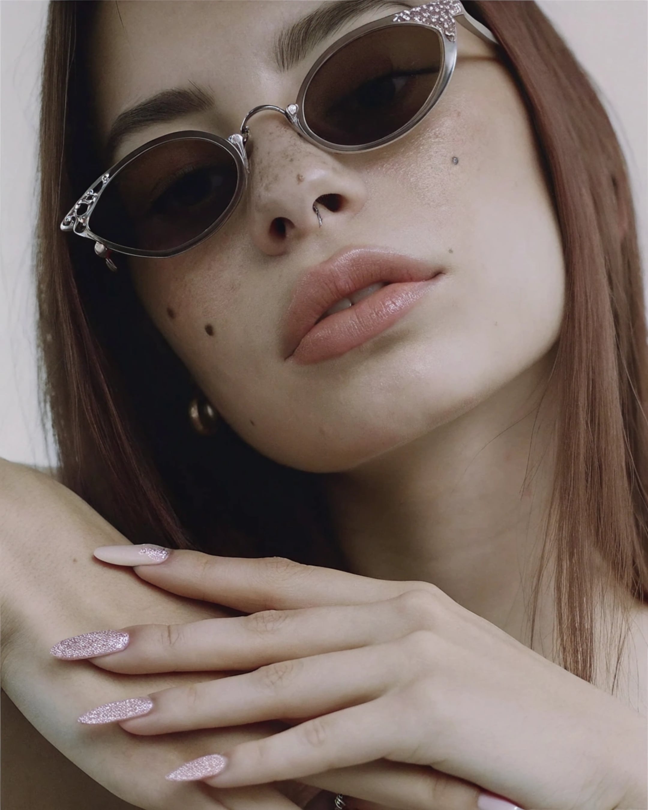 Face With Crystal Embellished Sunglasses And Septum Ring