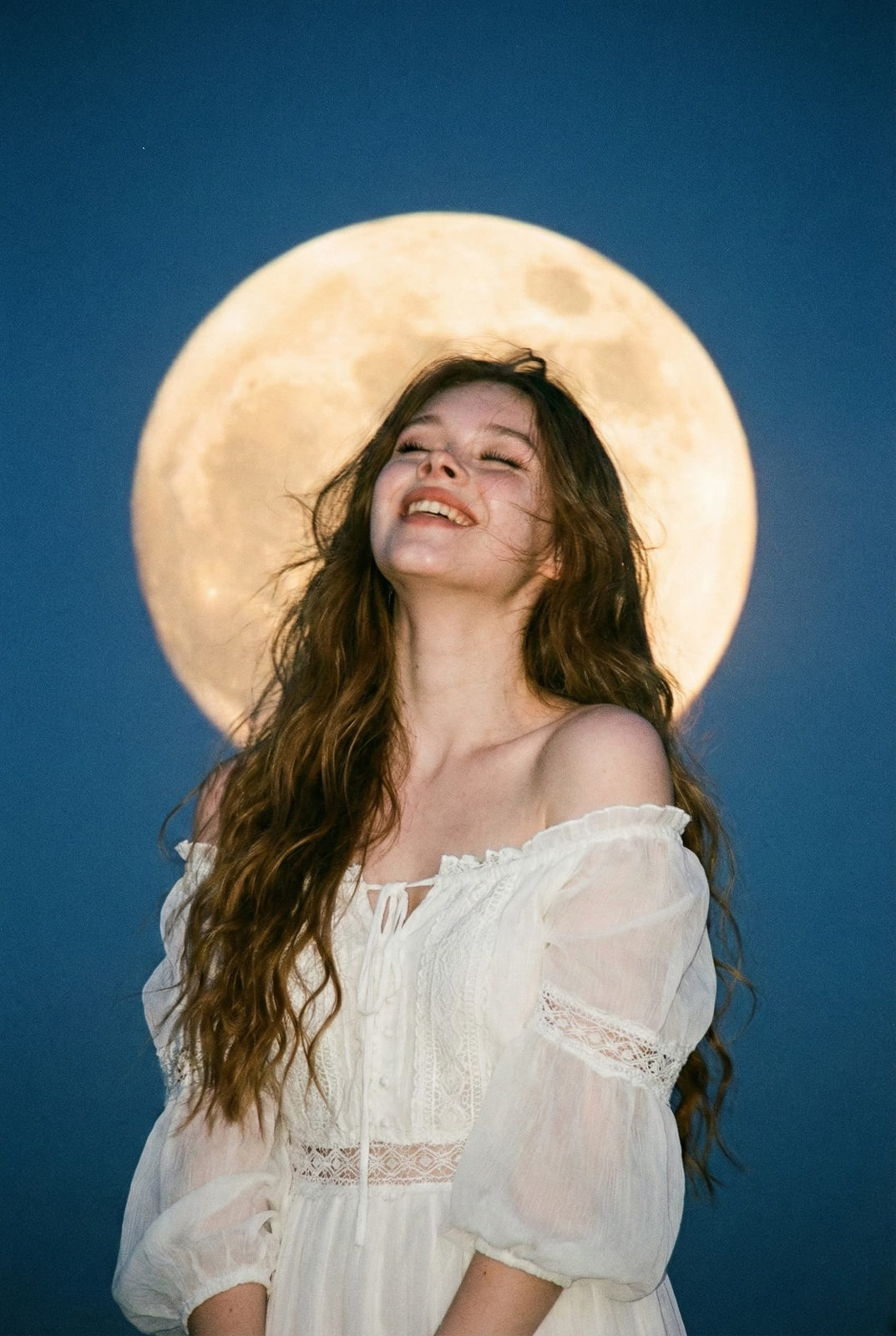 A close-up ultra-realistic portrait of a woman with long hair, smiling serenely under a glowing full moon, dressed in a light, flowing dress.