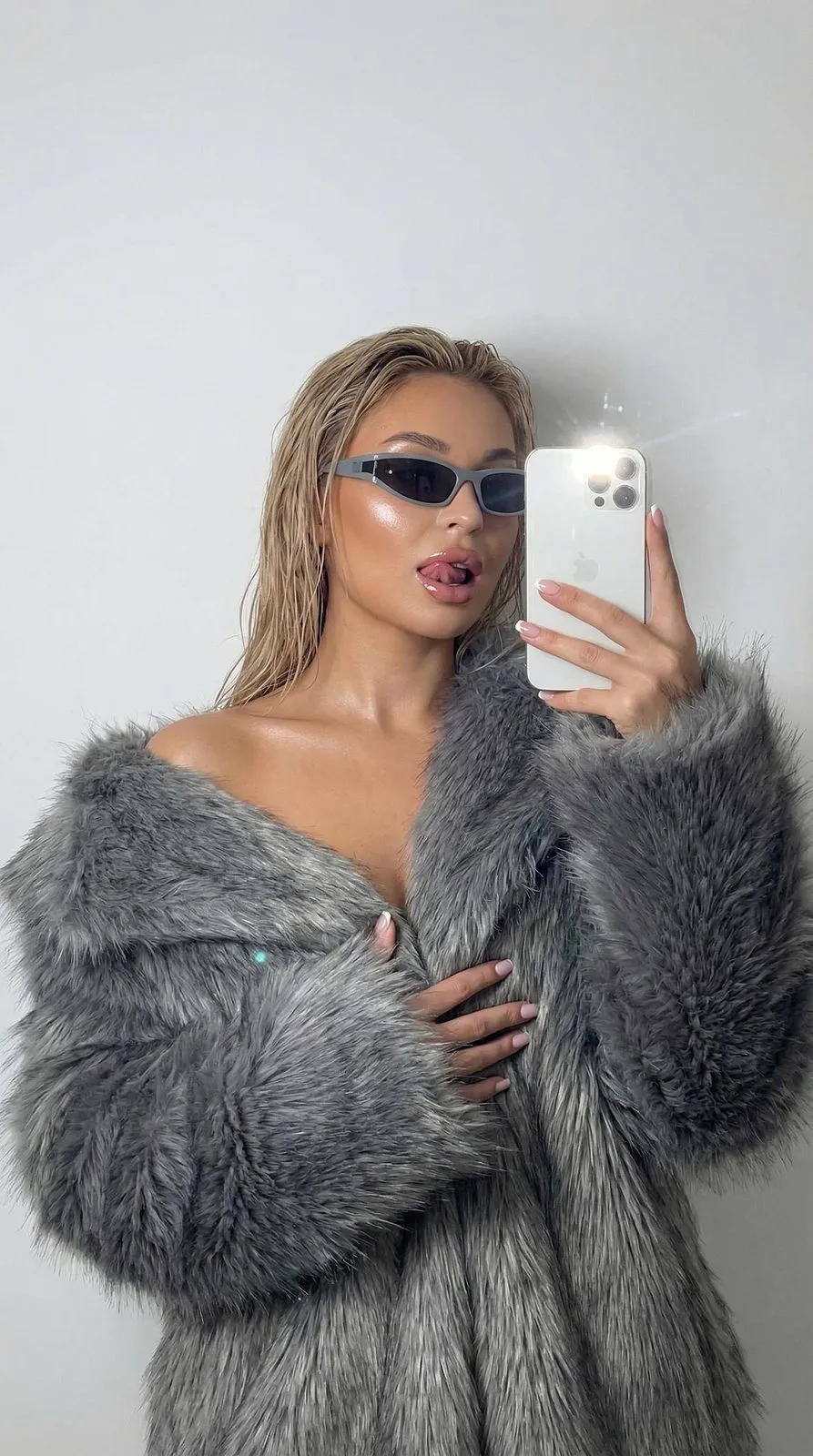 Sunglasses And Manicure In Mirror Selfie