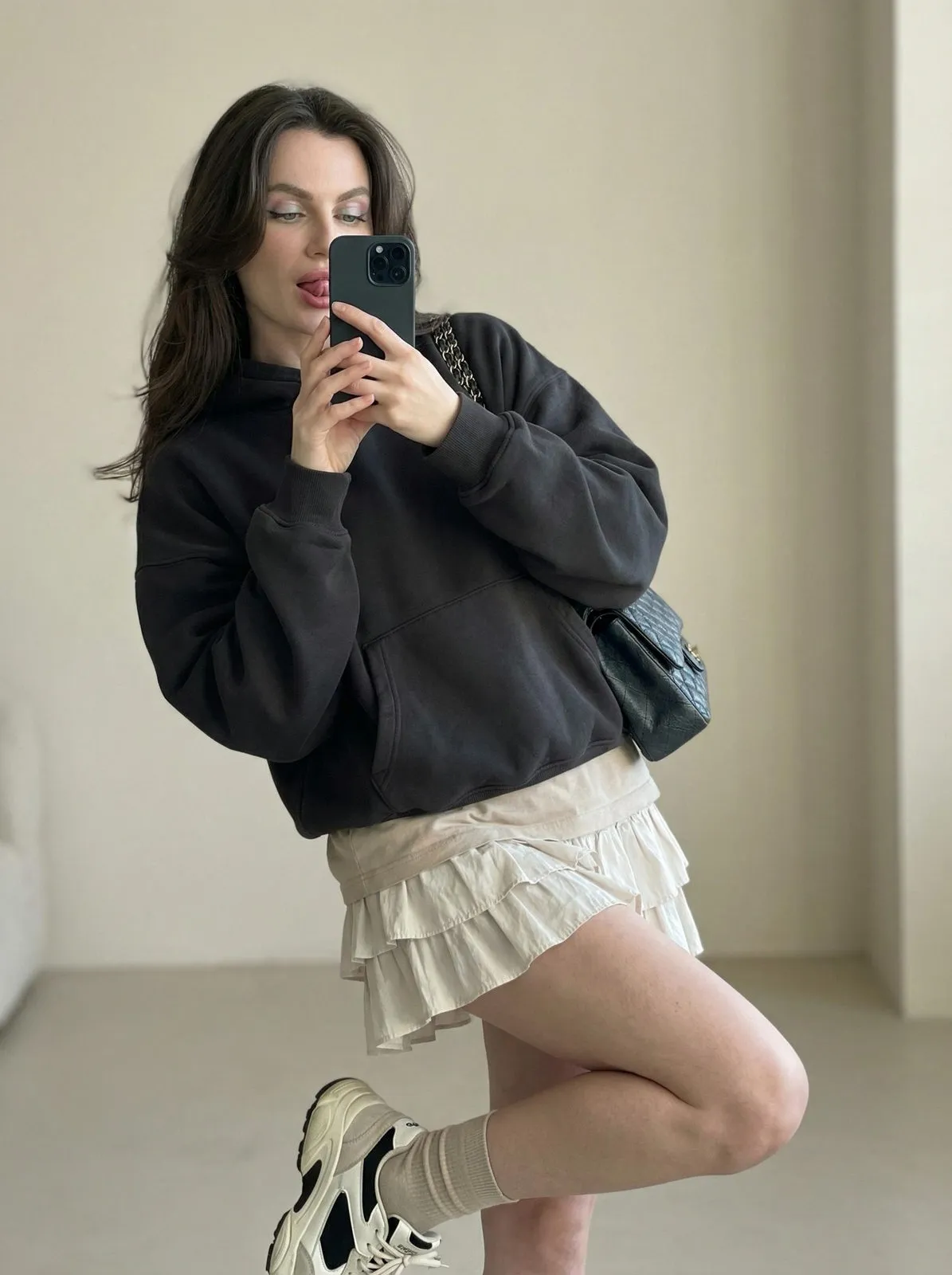 Playful Mirror Selfie Pose With Pastel Eyeshadow