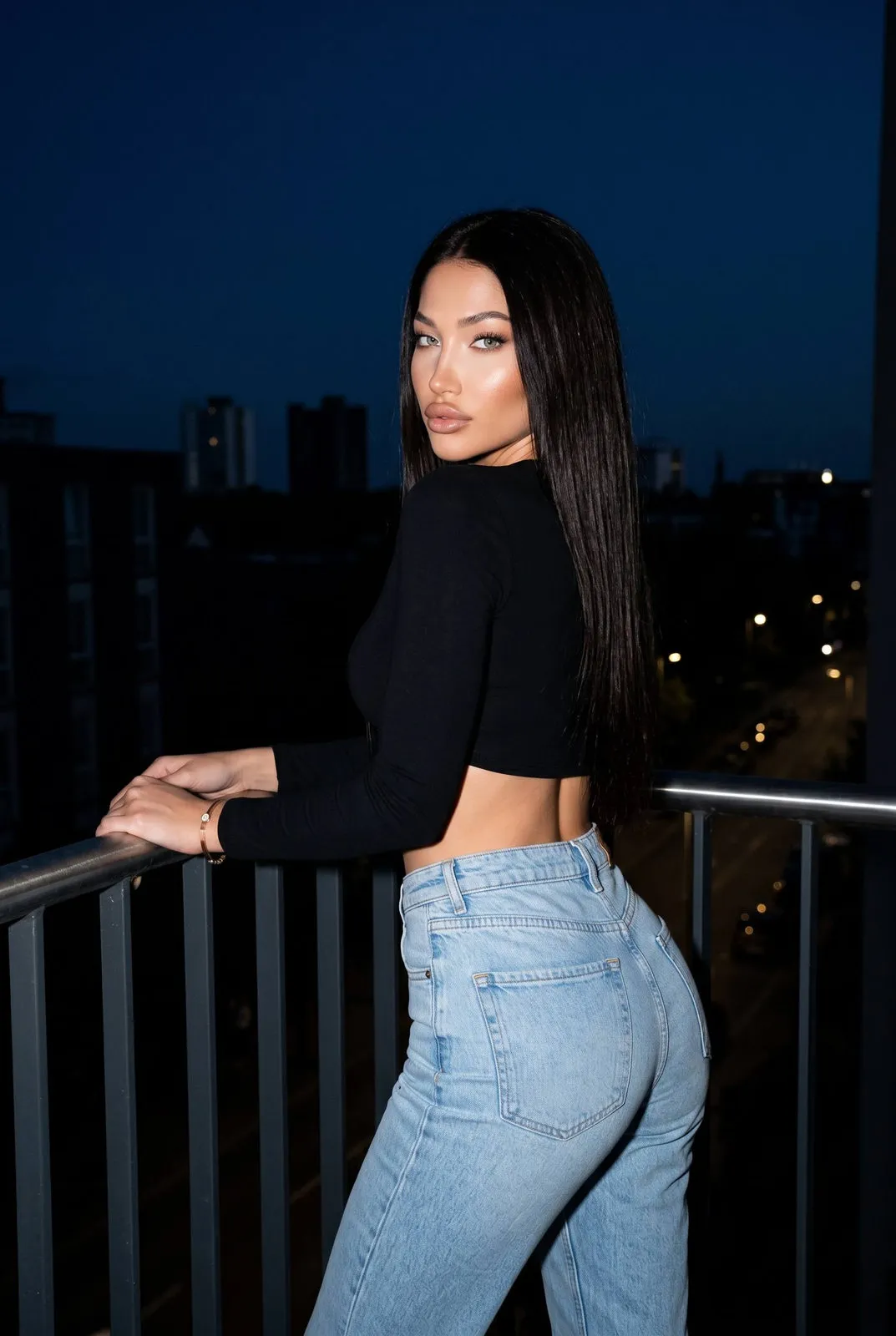 Night Balcony Confident Over Shoulder Pose Denim Jeans