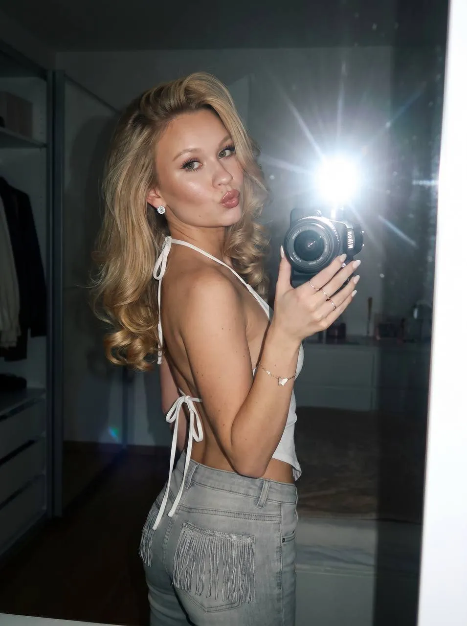 Earrings And Rings In A Mirror Selfie