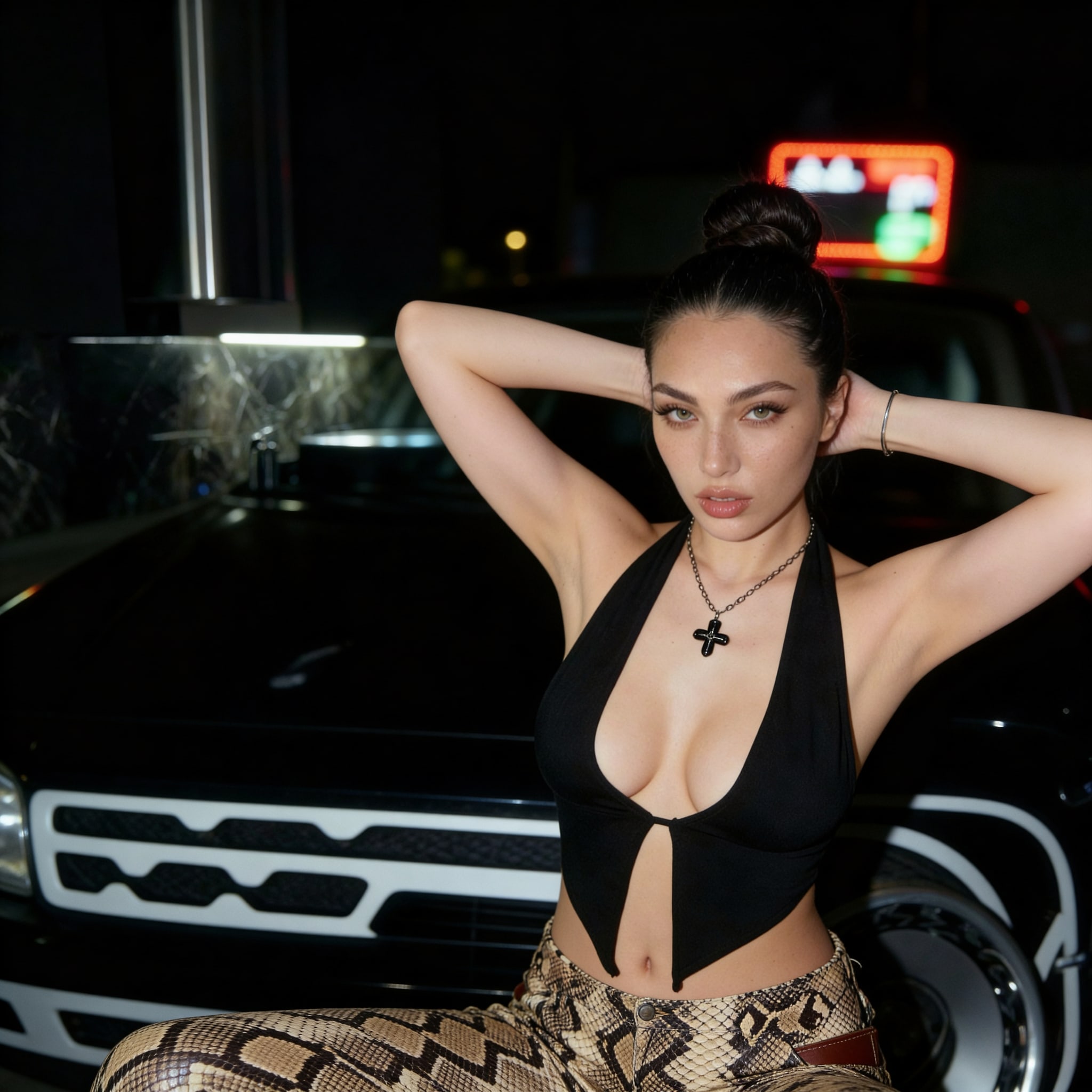 A streetwear girl posing under vibrant city lights at night.