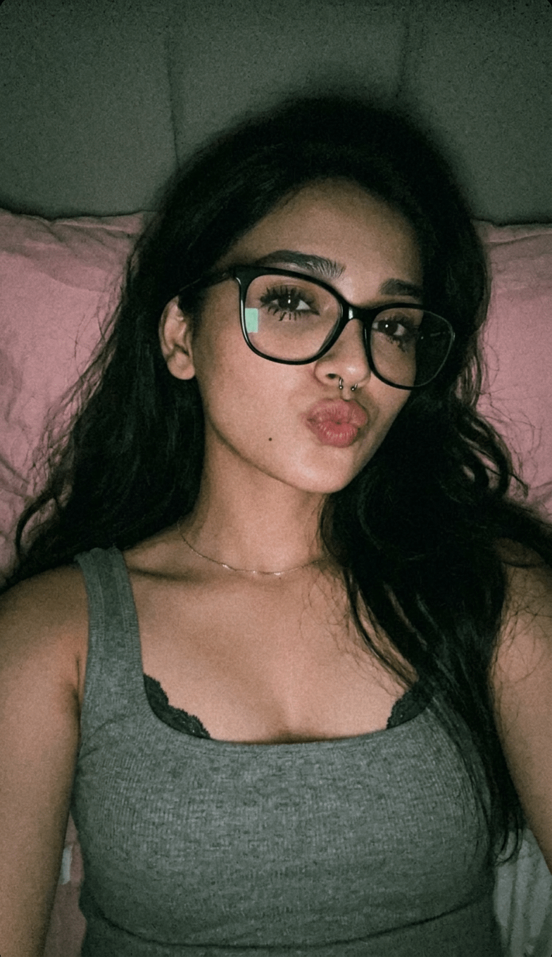 Realistic Person Dark Grey Headboard Pink Pillow reference photo