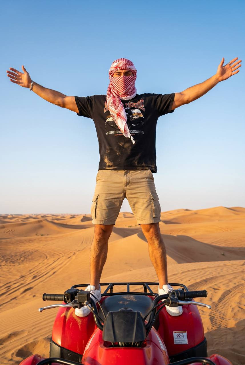 Triumphant On Red Quad Bike Desert