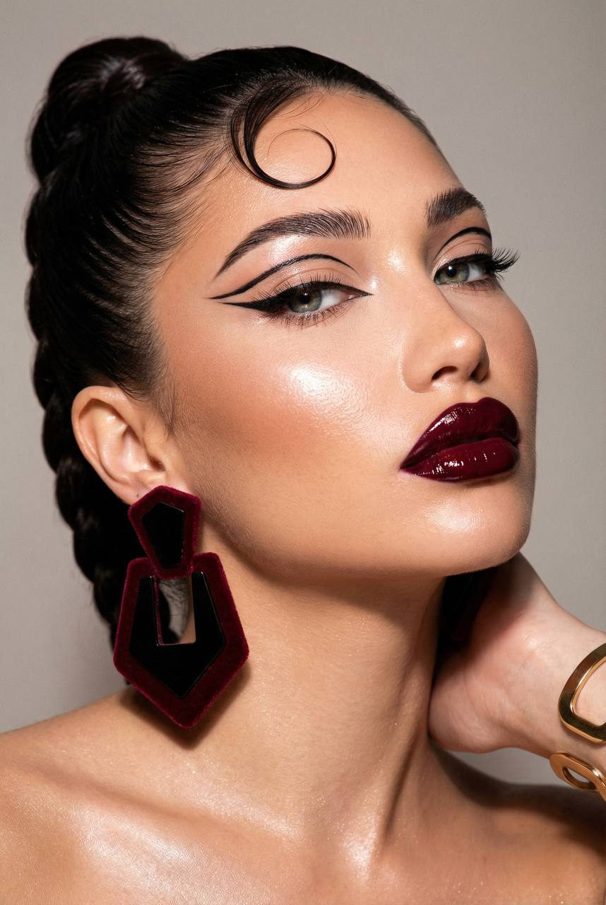 Ultra-detailed close-up of a woman with avant-garde makeup showcasing luminous skin and geometric earrings.