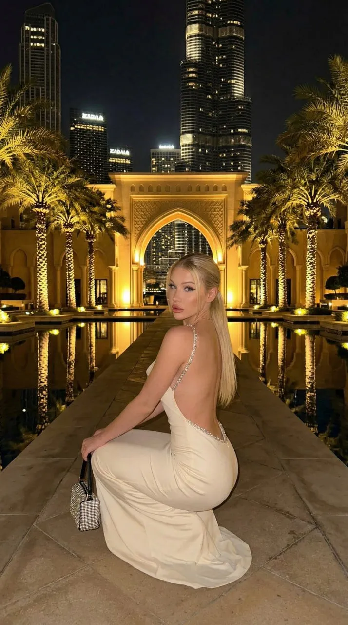 Dubai Night Fashion Portrait Crouching