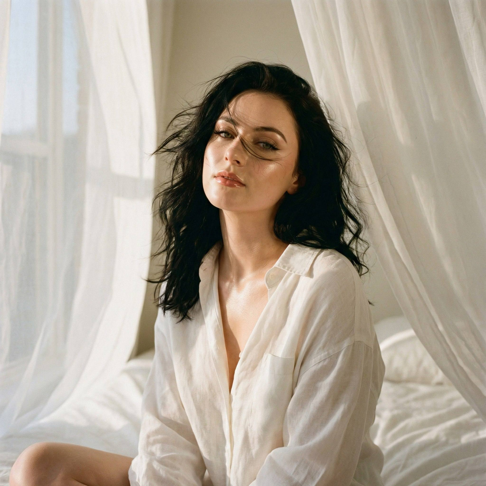 Ultra-realistic fashion portrait of a woman on a white bed, with flowing sheer fabric in warm golden light.
