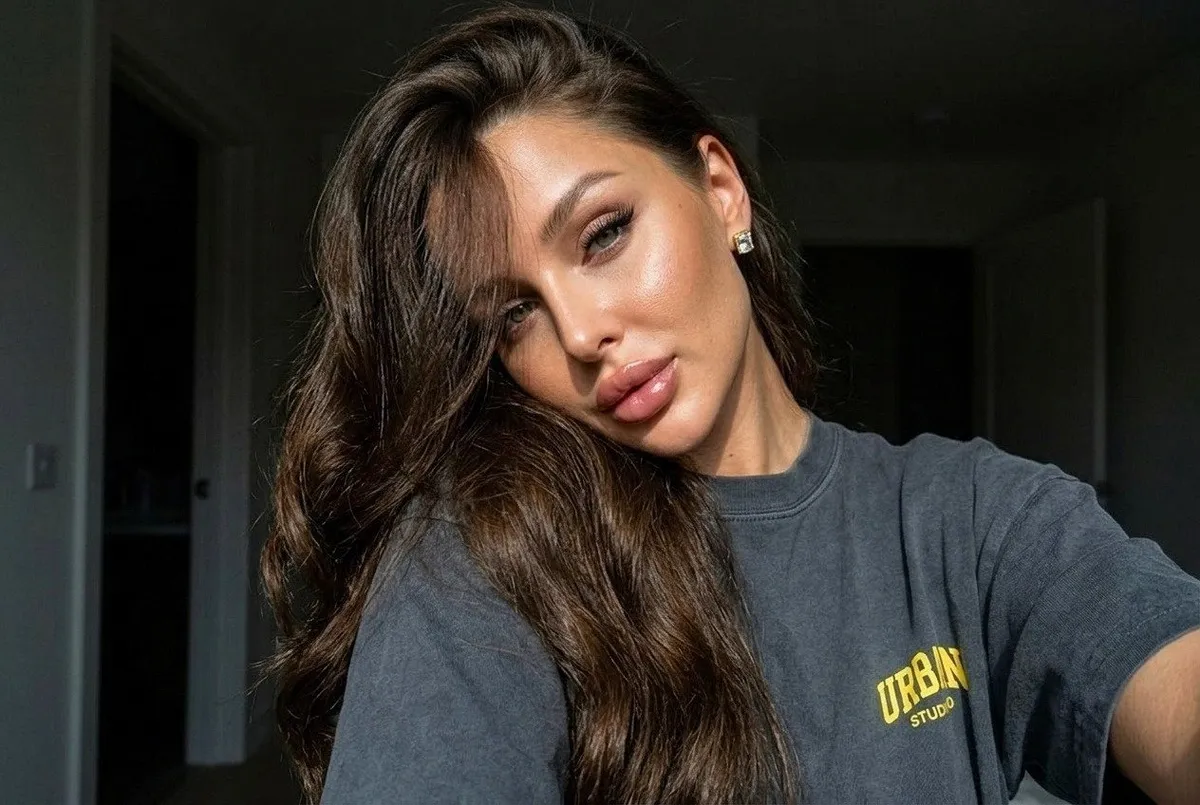 Makeup And Earrings In Casual Selfie