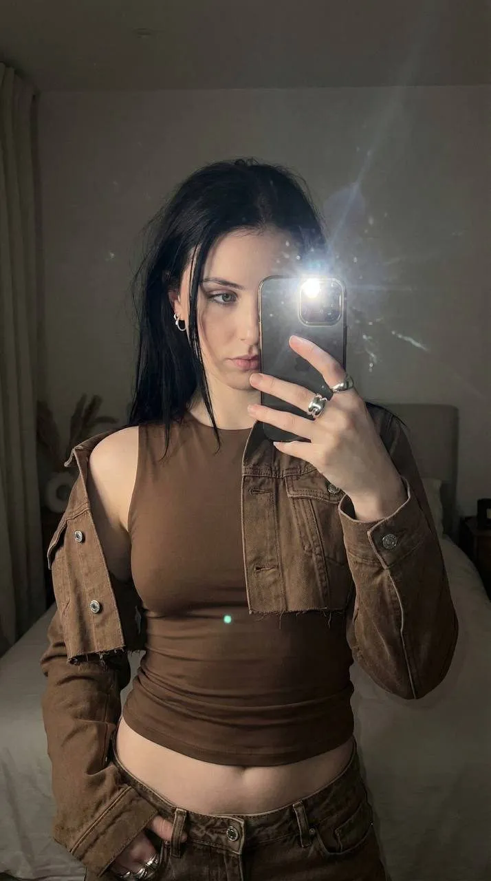 Earrings And Rings In Mirror Selfie