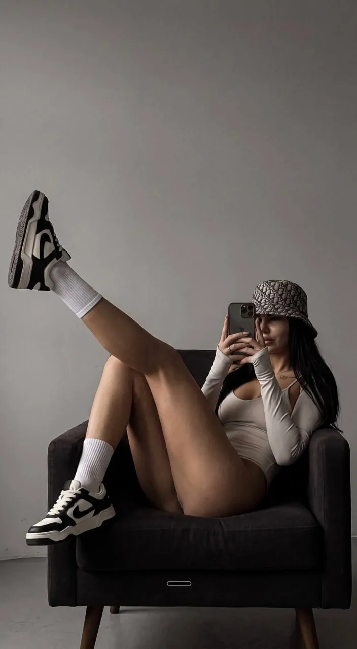Minimalist Studio Gray Wall Bodysuit Pose