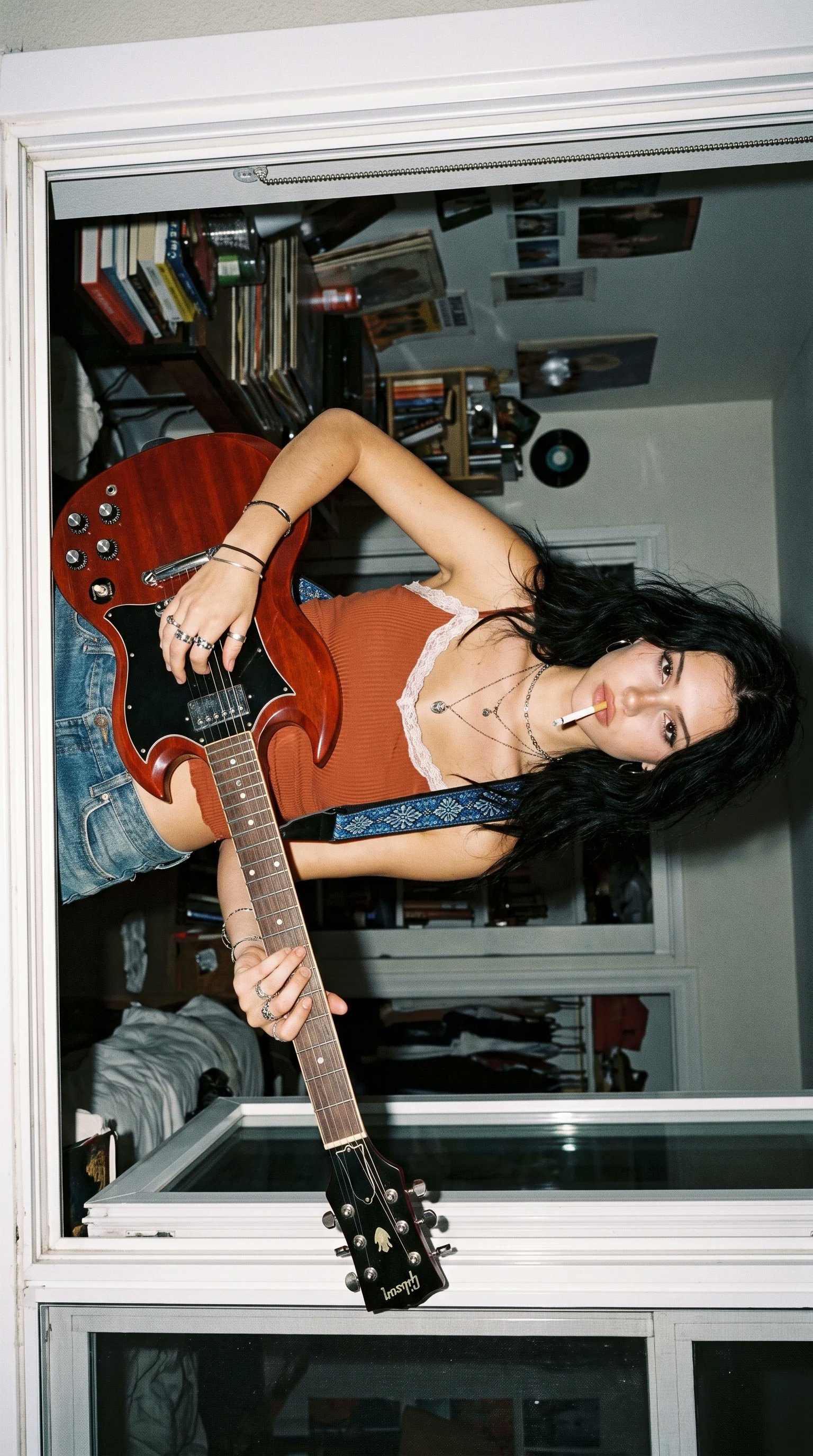 Upside Down Apartment Window Holding Gibson Guitar