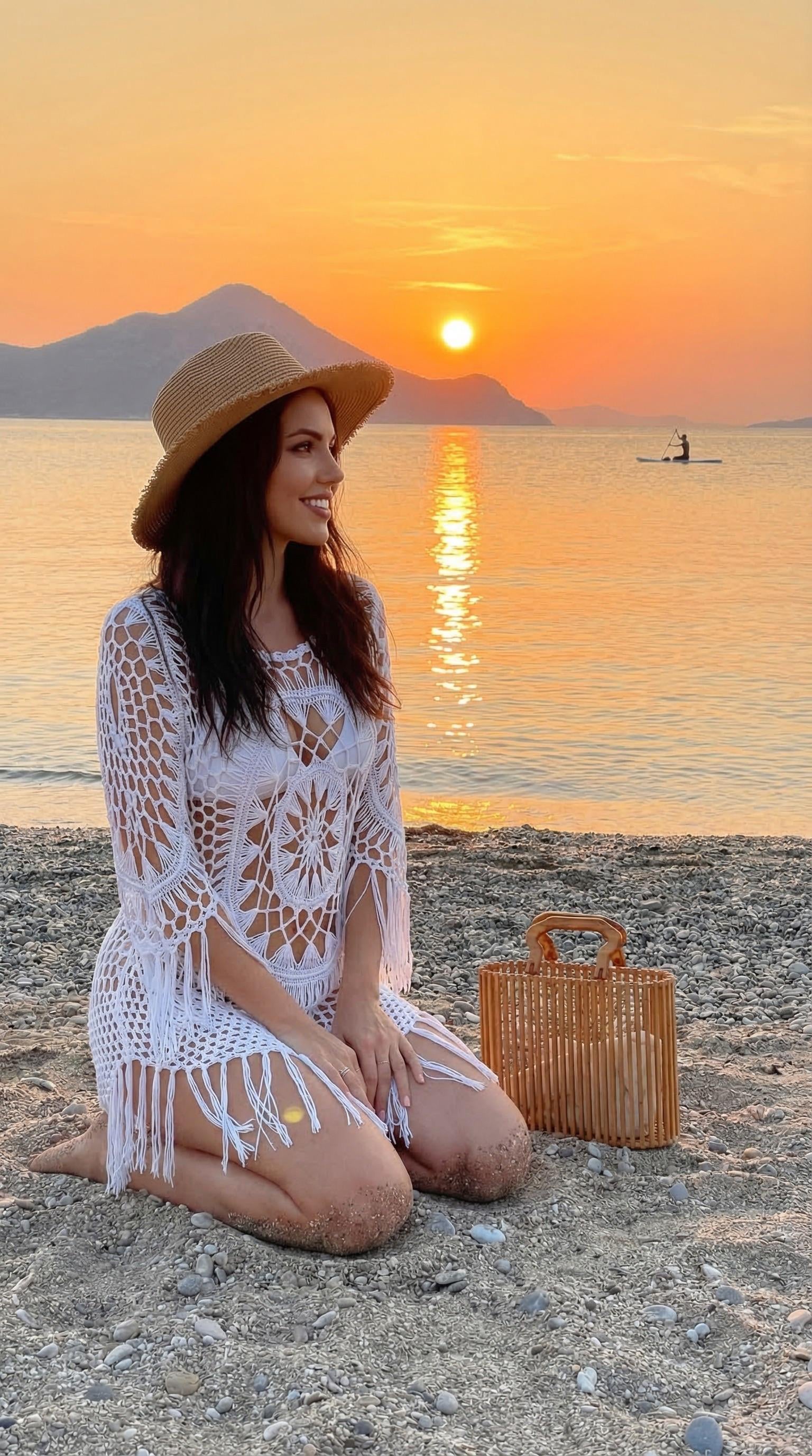 Kneeling On Pebble Beach Sunset White Crochet Cover Up Straw