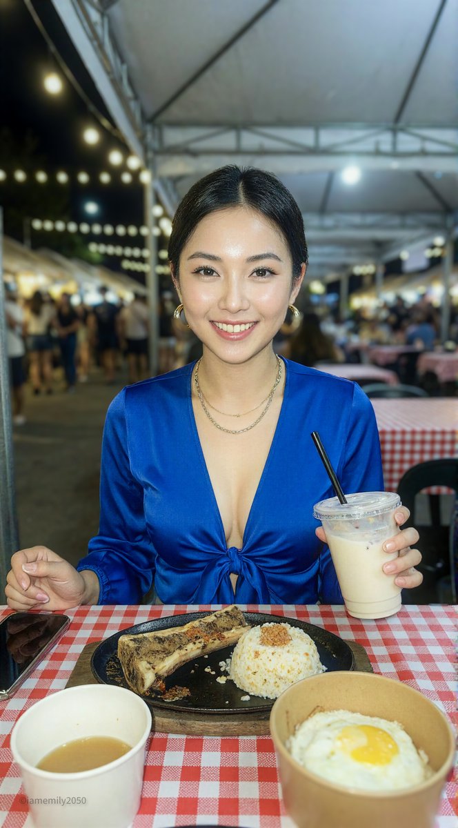 A young East Asian female in a vibrant Royal Blue satin blouse, seated at a night market table with roasted bone marrow and a blended shake, illuminated by warm ambient lights.