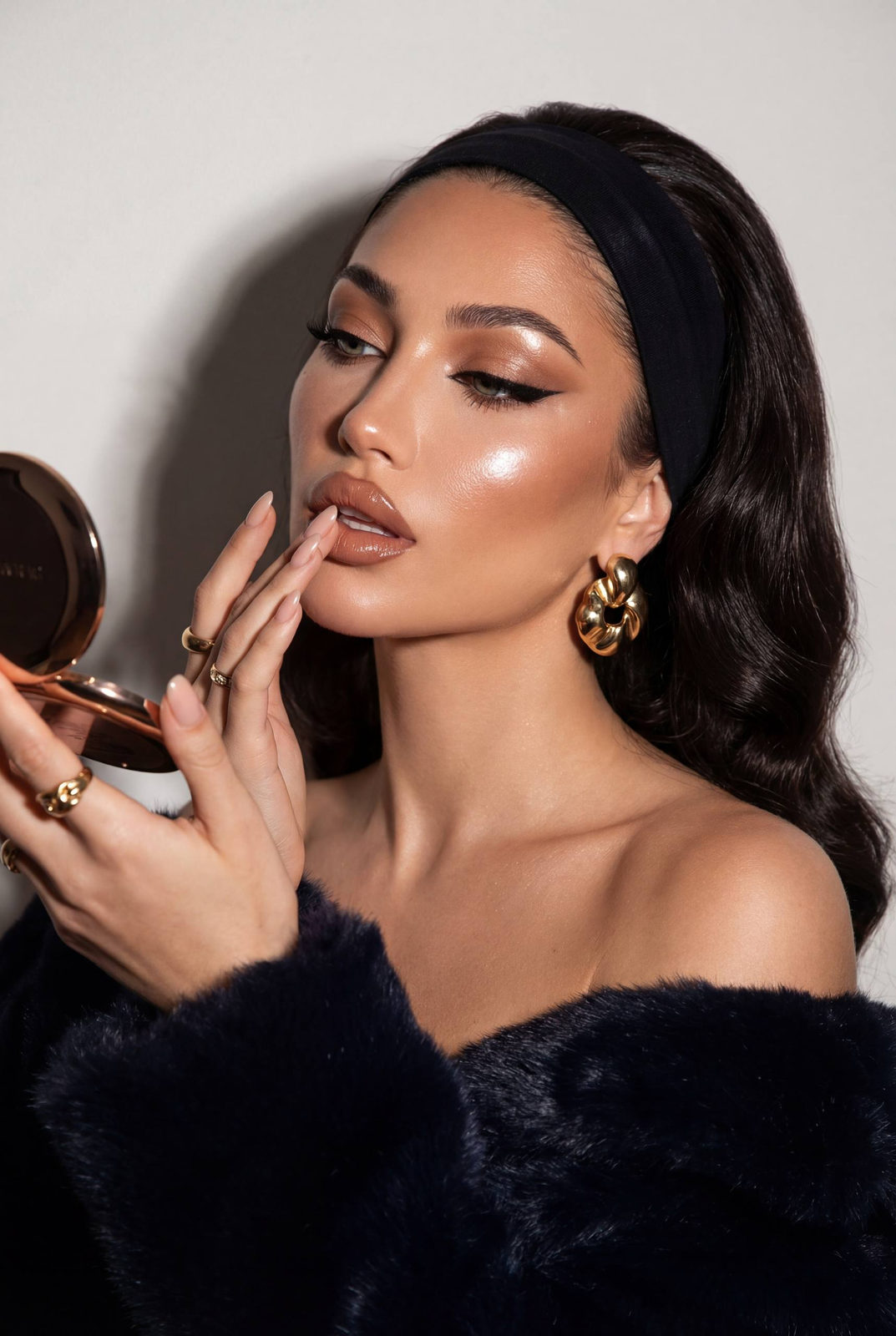 Ultra-realistic vintage beauty portrait with soft vintage waves, dramatic winged eyeliner, and soft nude nails.