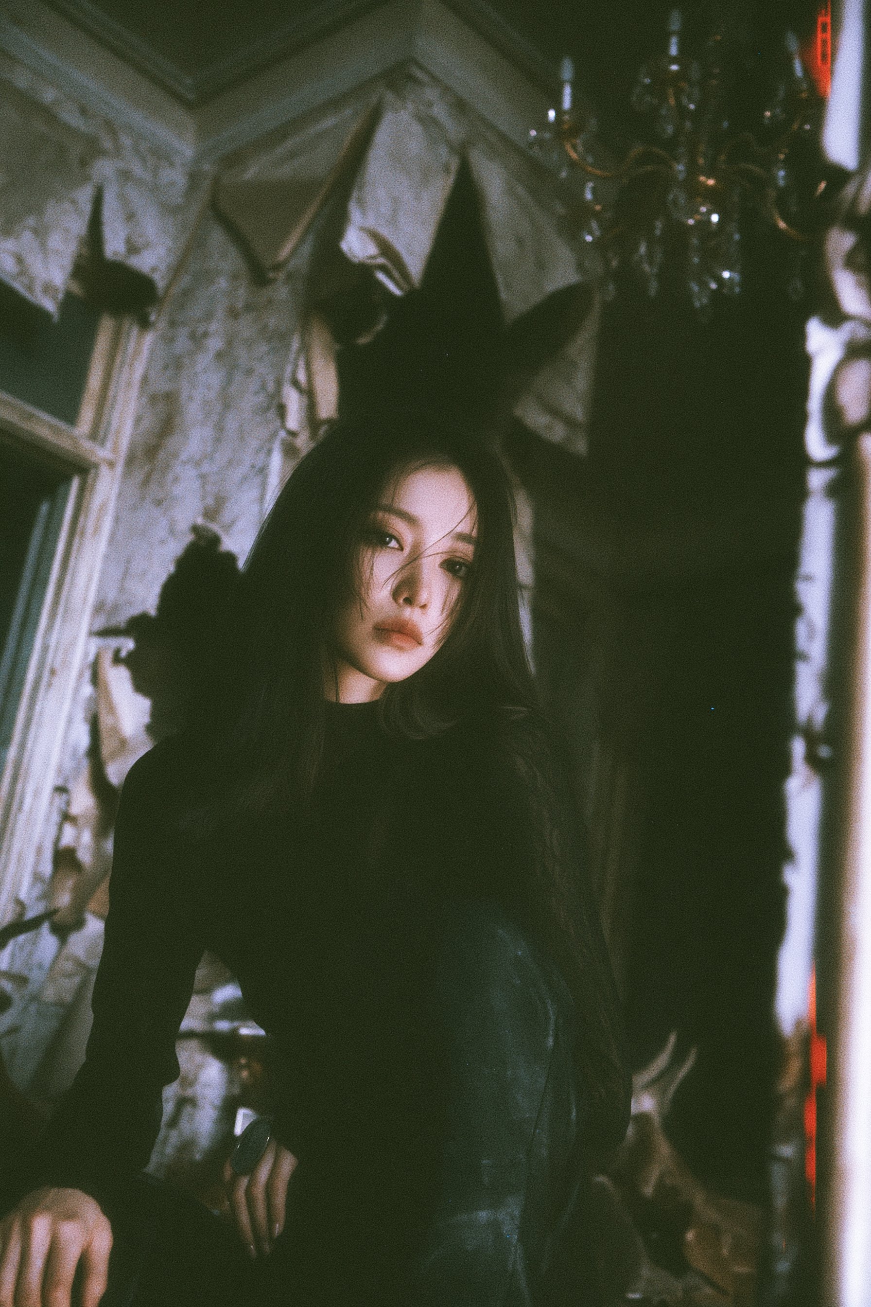 Dimly Lit Decaying Room Solemn Gaze Cinematic Atmosphere