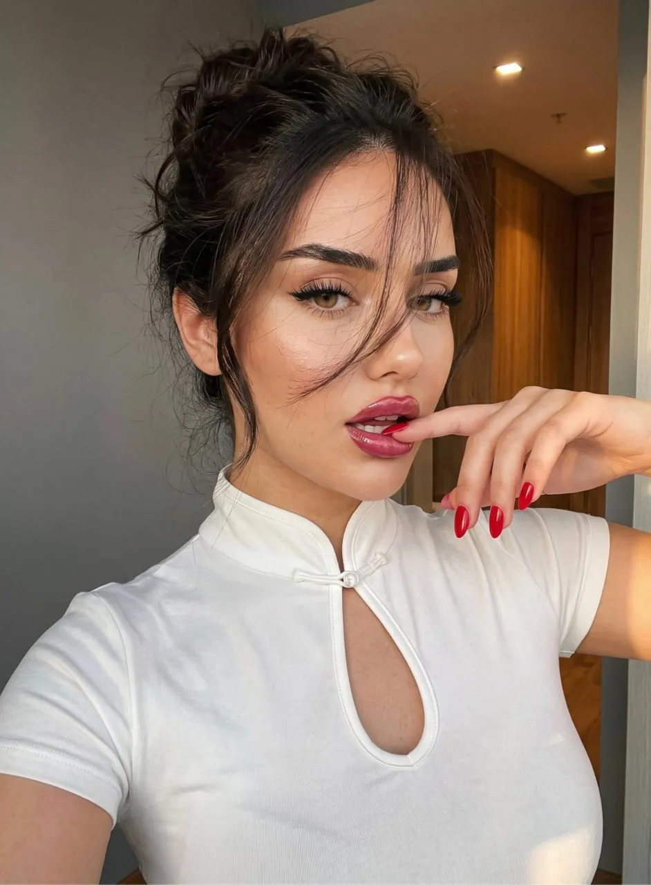 Flirtatious Selfie Red Manicure Touching Lip