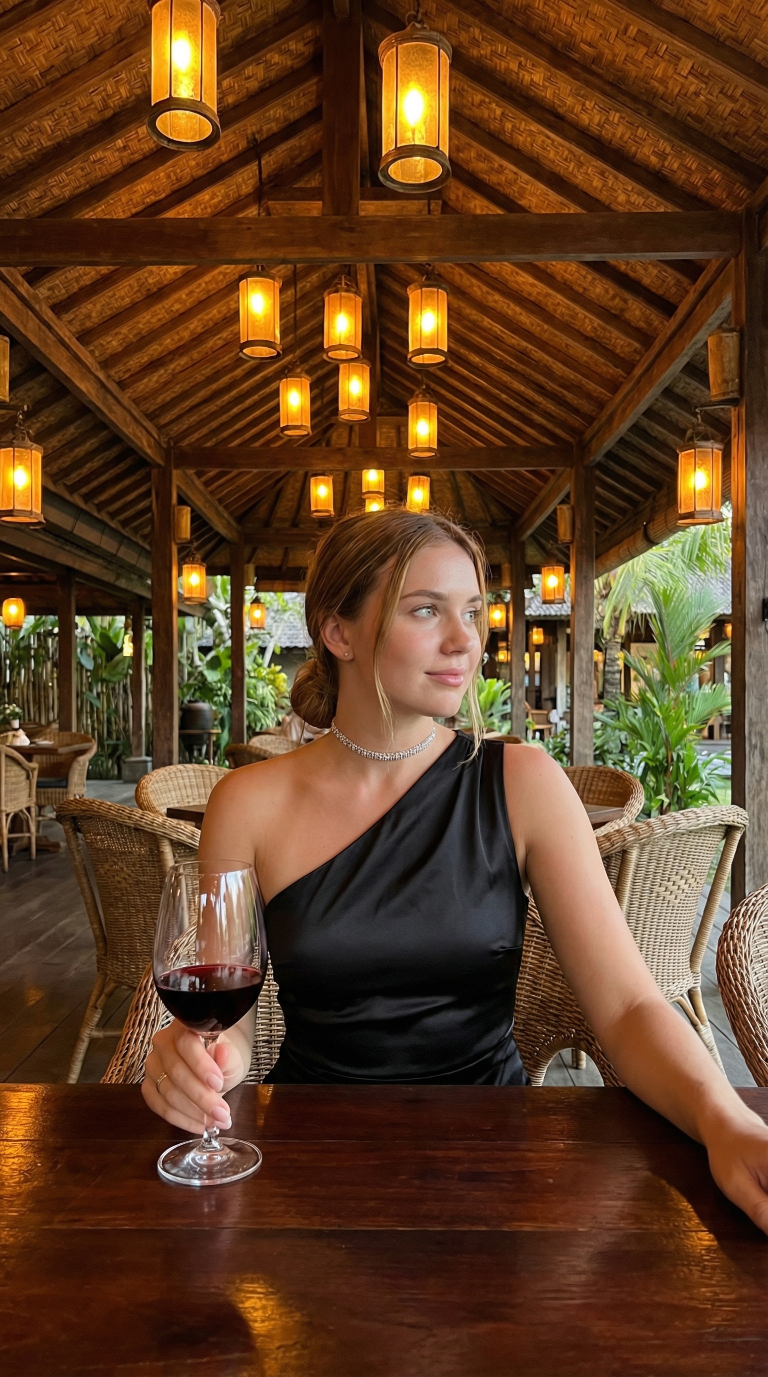 Black Satin Dress Red Wine Restaurant Patio Amber Lanterns
